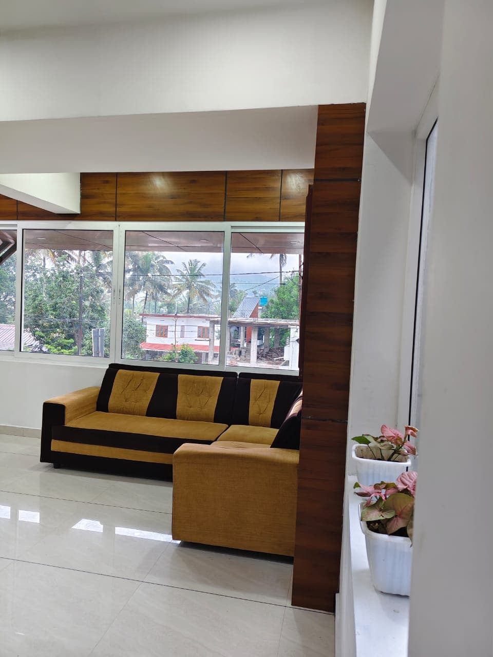 Luxury deluxe room with king-size bed and hill views